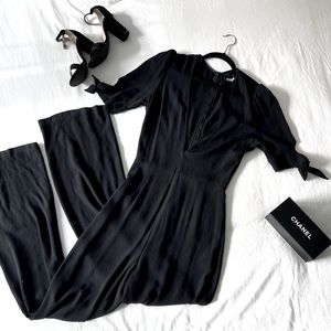 {reformation} black v-neck jumpsuit